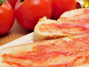 ¿Cuál es el origen del pan con tomate?